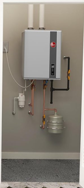 Tankless water heater unit mounted on wall with pipes and connections